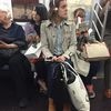 Photos: Levitating Straphanger Squeezes Into Invisible Subway Seat